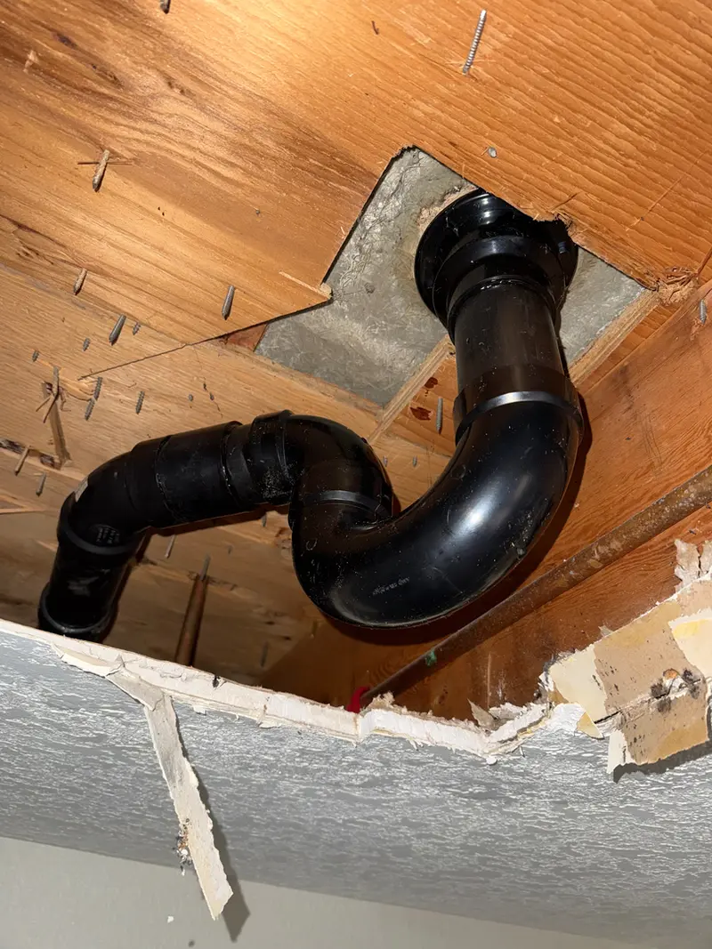 ABS drain & vent pipe repair through ceiling joists in Boring, Oregon — drain line repair by Bigfoot Plumbing licensed plumber