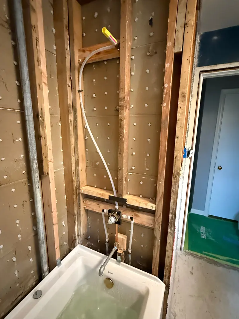 Shower valve rough-in for bathtub during full bathroom renovation in Sandy, Oregon — shower plumbing and remodel by Bigfoot Plumbing